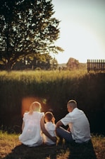 A serene family enjoying a sunny afternoon in their backyard, symbolizing peace of mind.
