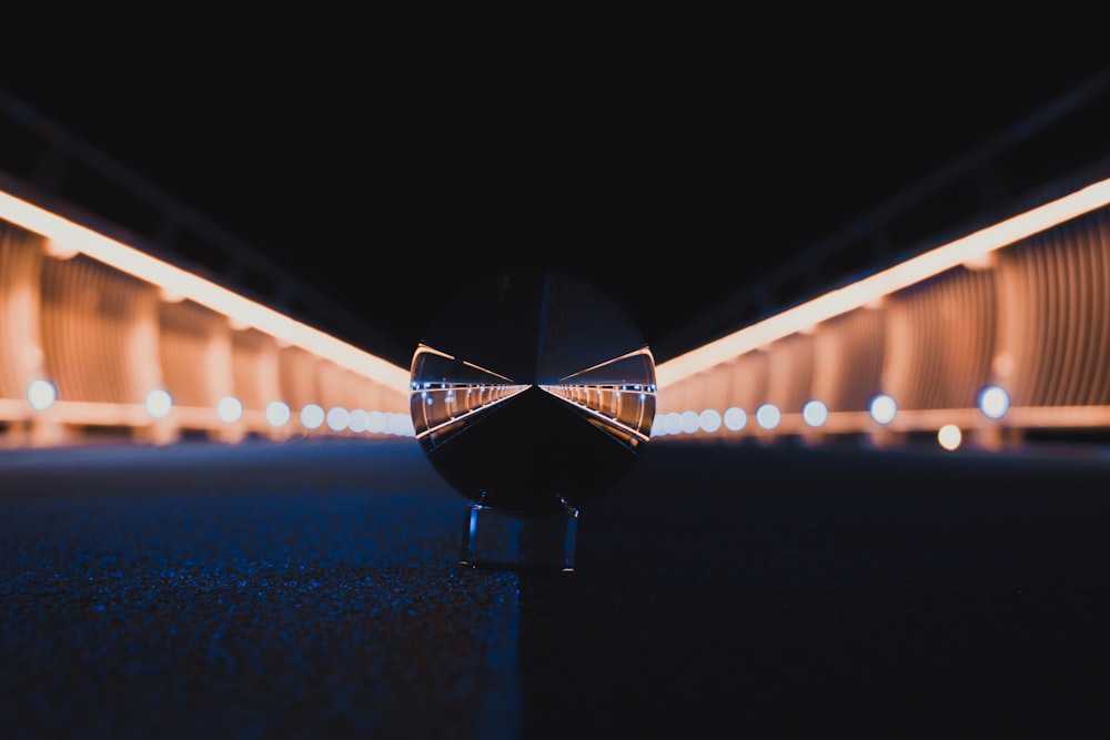 a blurry photo of a bridge at night