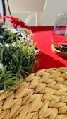 A set of placemats featuring vibrant nature photography laid out on a dining table.