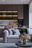 a living room filled with furniture and decor