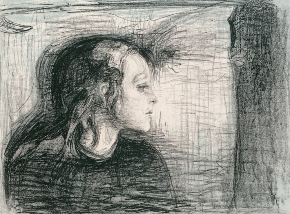 a drawing of a woman's profile in a mirror
