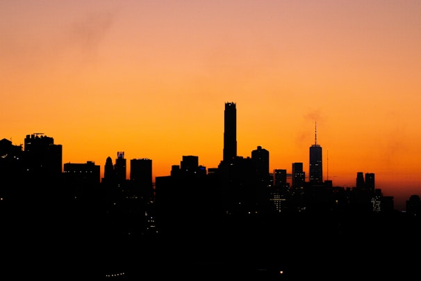 City skyline at sunset representing growth and success.