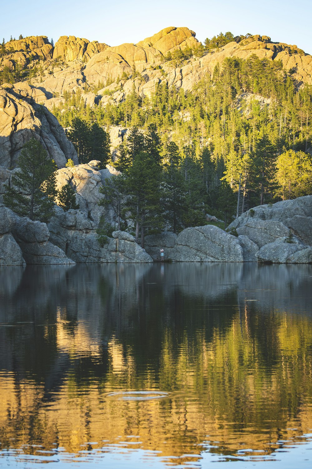 a large body of water surrounded by mountains