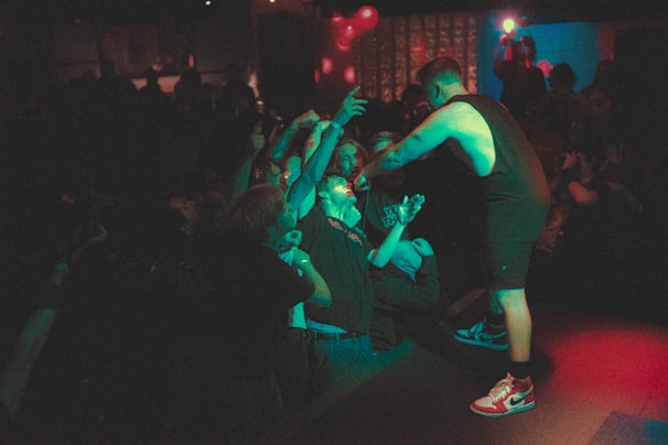 Tuzo Jerome connecting with the audience during a concert.