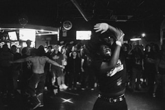 An enthusiastic audience enjoying a live dance event.
