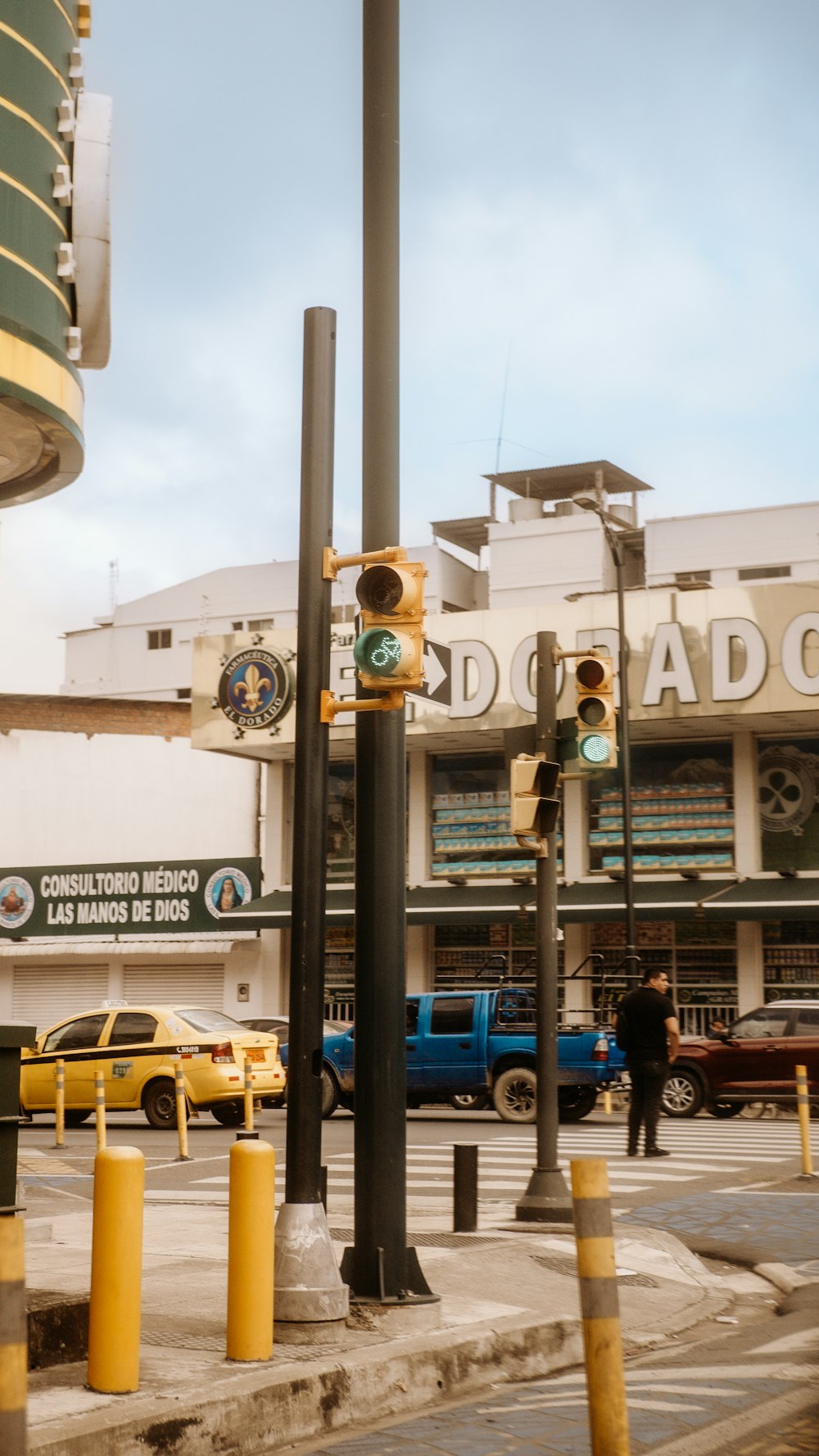 a traffic light sitting on the side of a road