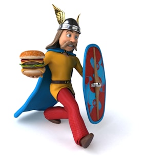 A cartoon-style character dressed as a Viking, wearing a helmet with wings and a blue cape. The character holds a hamburger in one hand and a shield decorated with red and blue patterns in the other. The character has long brown hair and a mustache, and is wearing a yellow tunic and red plaid pants. The scene conveys a humorous and whimsical atmosphere.
