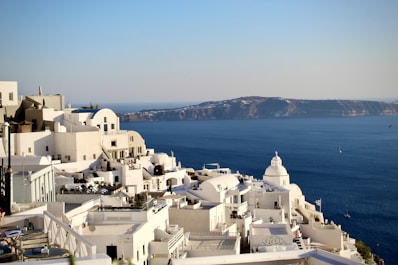 a view of the ocean from the top of a hill
