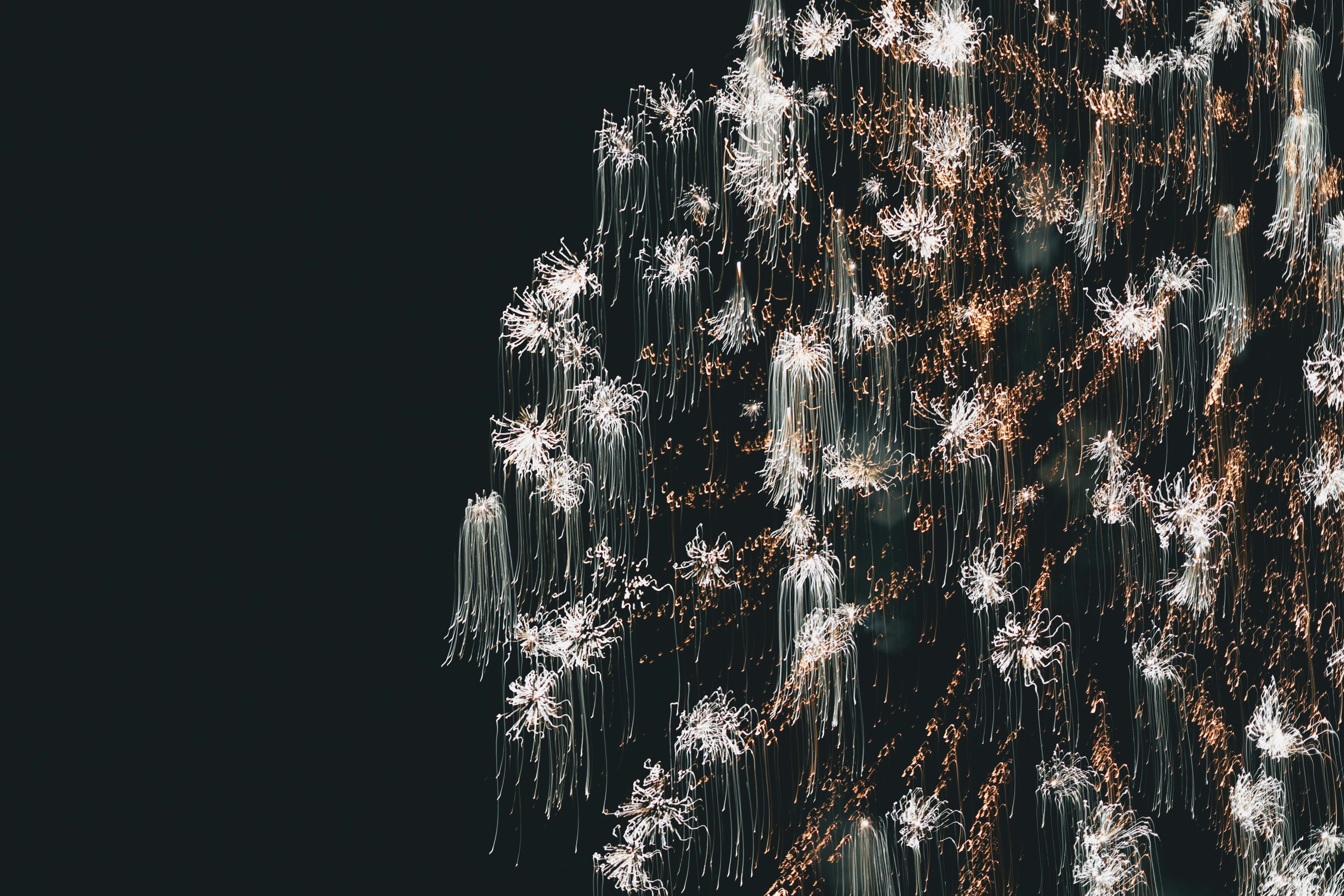 a bunch of fireworks are lit up in the night sky