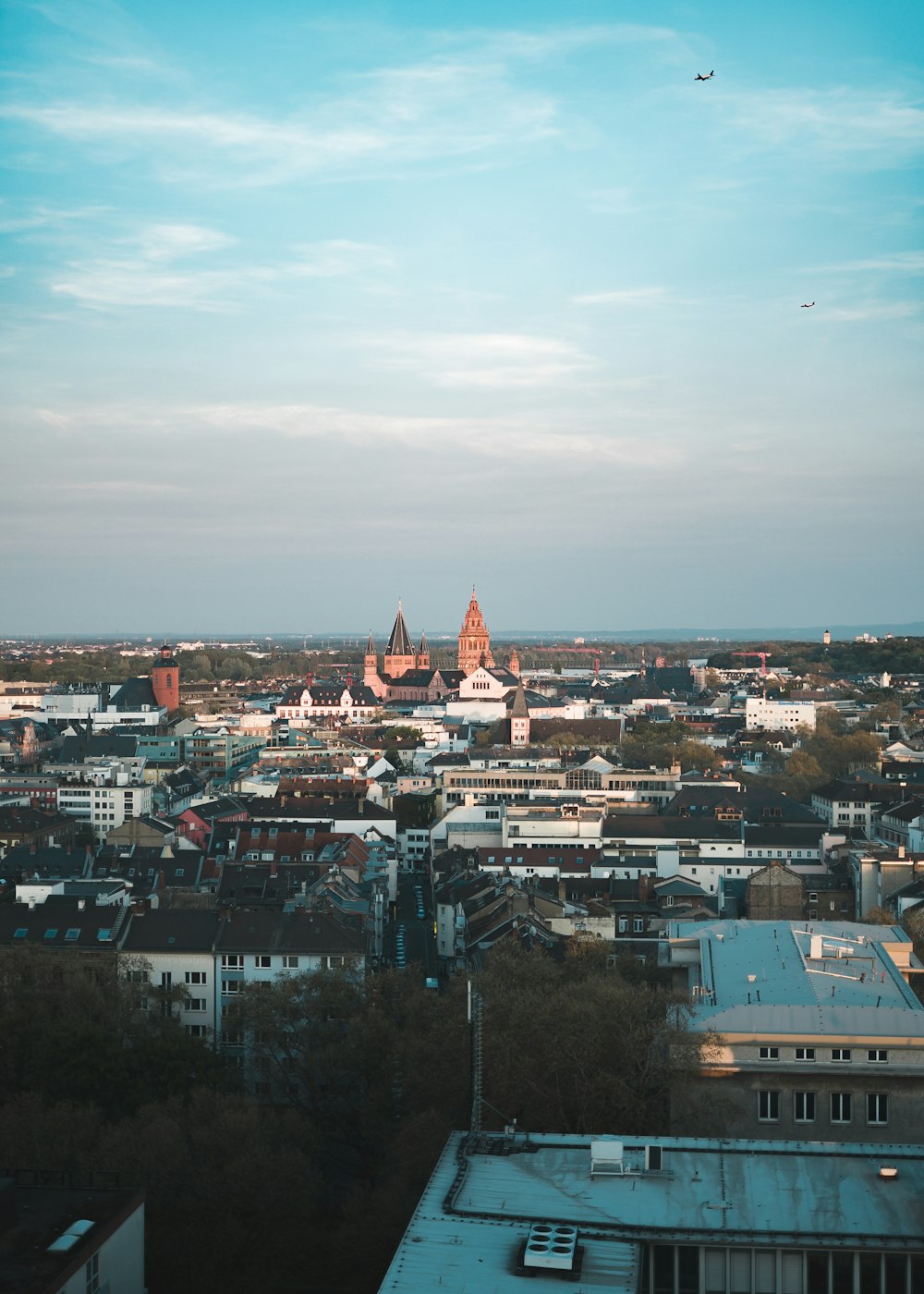 a view of a city from the top of a building