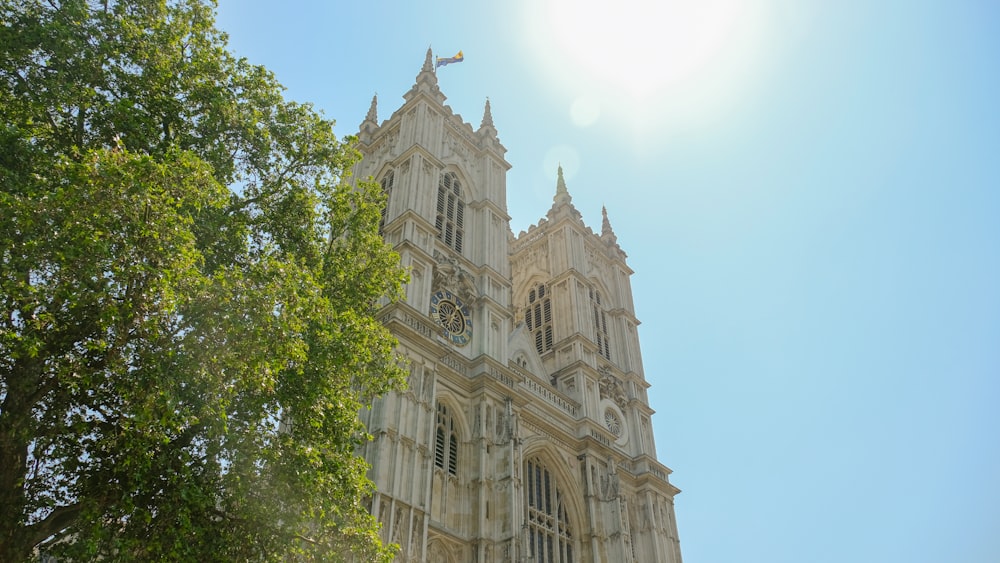 a tall building with a clock on the front of it