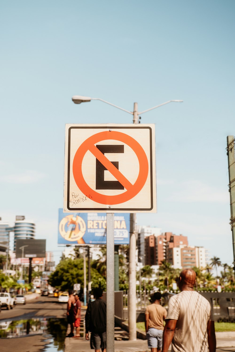 a no left turn sign on the side of the road