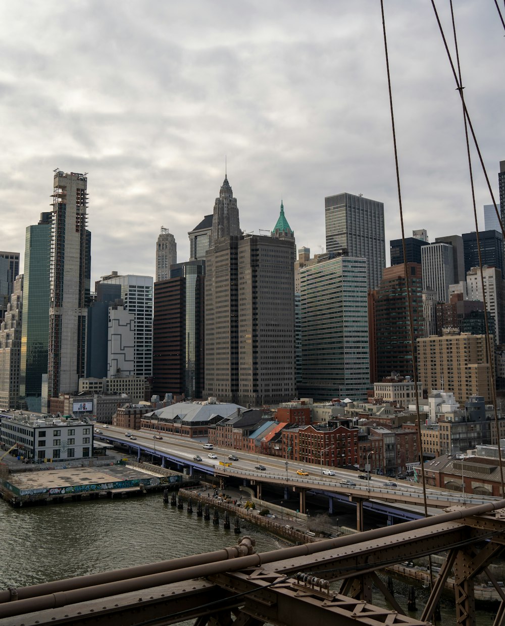 a view of a city from a bridge