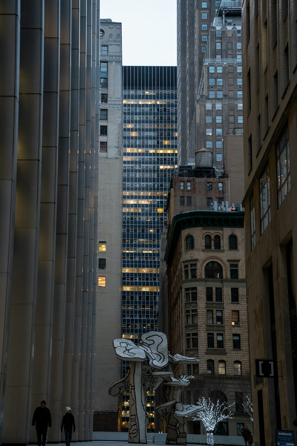 a statue in the middle of a city street