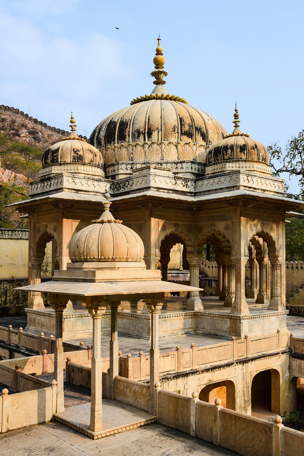 a large stone structure with a dome on top of it