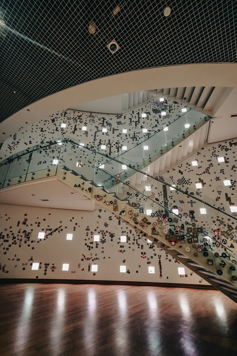 a large staircase with lots of people walking up and down it