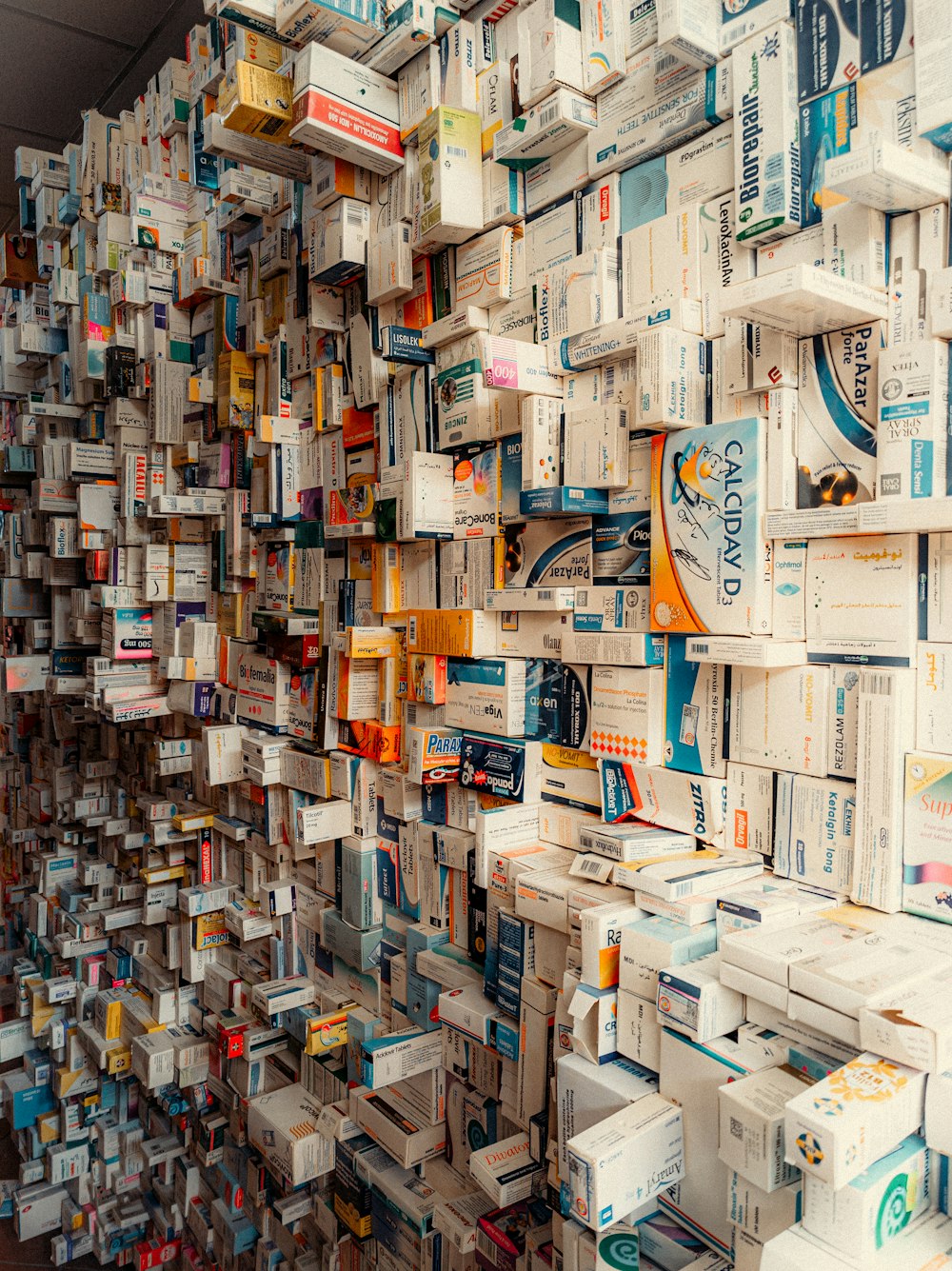 a large amount of cigarettes stacked on top of each other