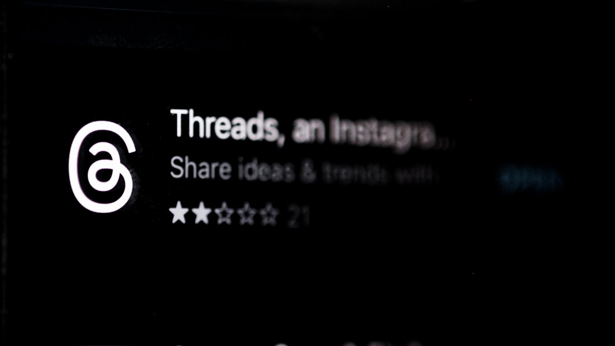 Threads content creation showing text posts, images, and topic tags on Meta's conversation-first platform