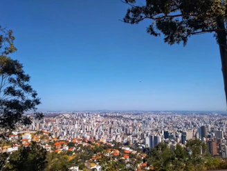 a view of a city from the top of a hill