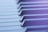 Close-up view of piano keys with a soft focus and a gentle blur effect. The lighting creates a serene and tranquil atmosphere.