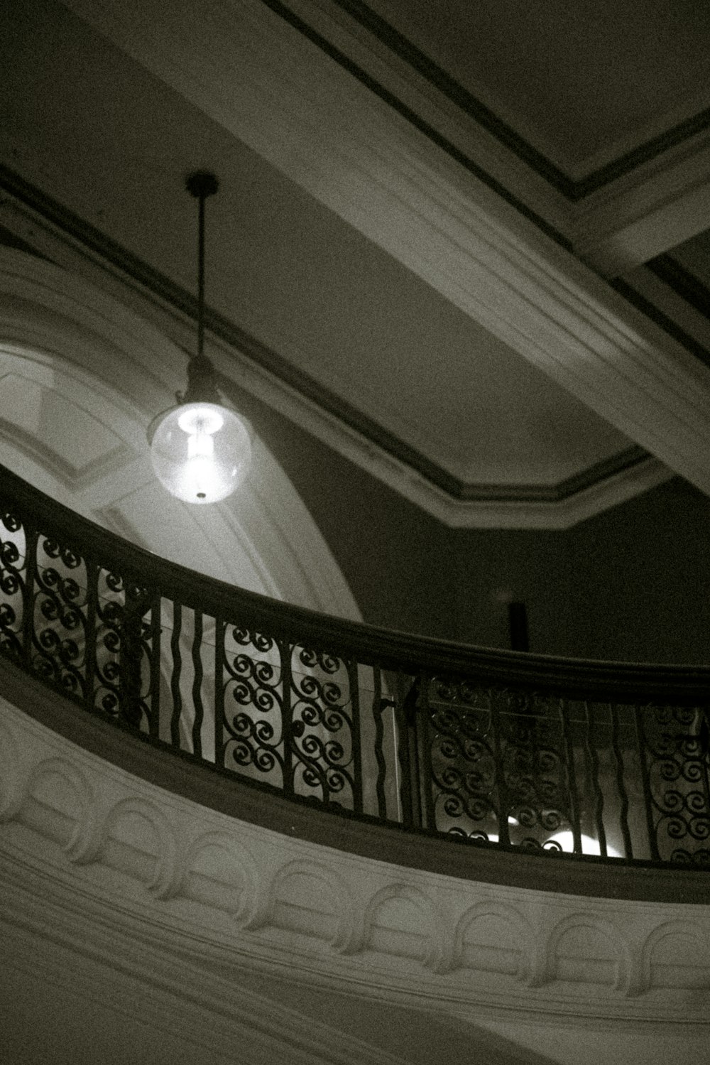 a black and white photo of a staircase