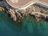 Minimalist map highlighting Benidorm's coastal walk route.
