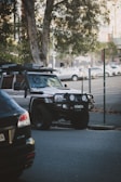 a jeep is parked on the side of the road