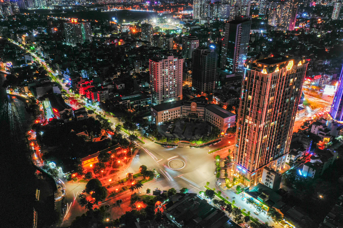 Cinematic aerial night view of Hanoi's illuminated skyline