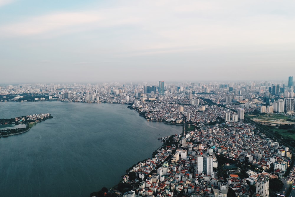 a large body of water surrounded by tall buildings