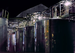 a group of large metal tanks sitting next to each other