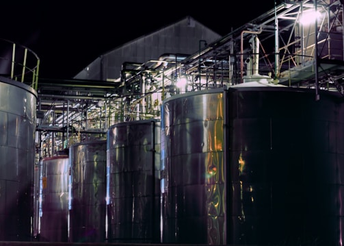 a group of large metal tanks sitting next to each other