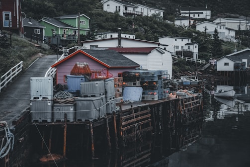 Traditional fishing boats docked at a small Cantabrian coastal village