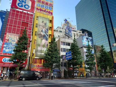 A vibrant wide format print showcasing a colorful outdoor advertising banner in a busy urban setting.