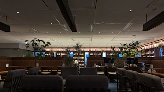 Warm, inviting workspace with soft lighting and cozy seating, reflecting a relaxed atmosphere.