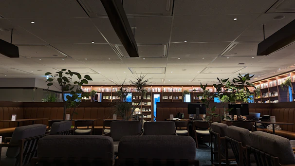 Warm, inviting workspace with soft lighting and cozy seating, reflecting a relaxed atmosphere.