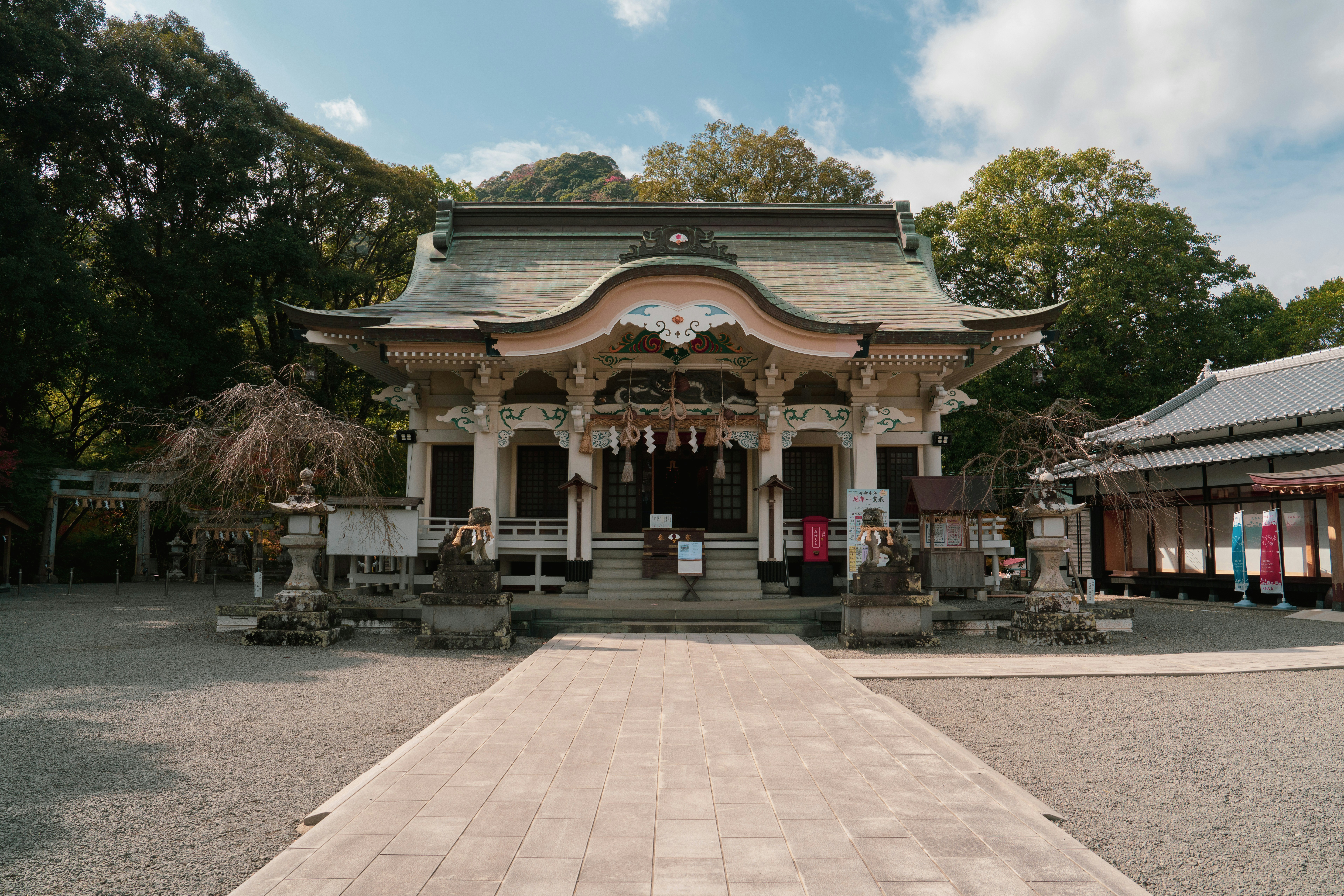 a small building with a walkway in front of it
