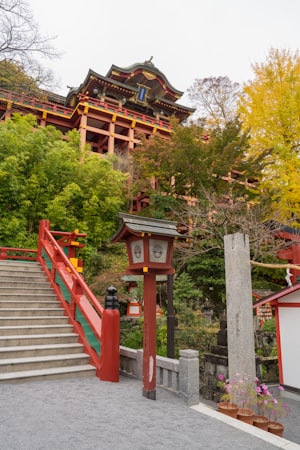 Red torii gate and stone steps at Yutoku Inari Shrine