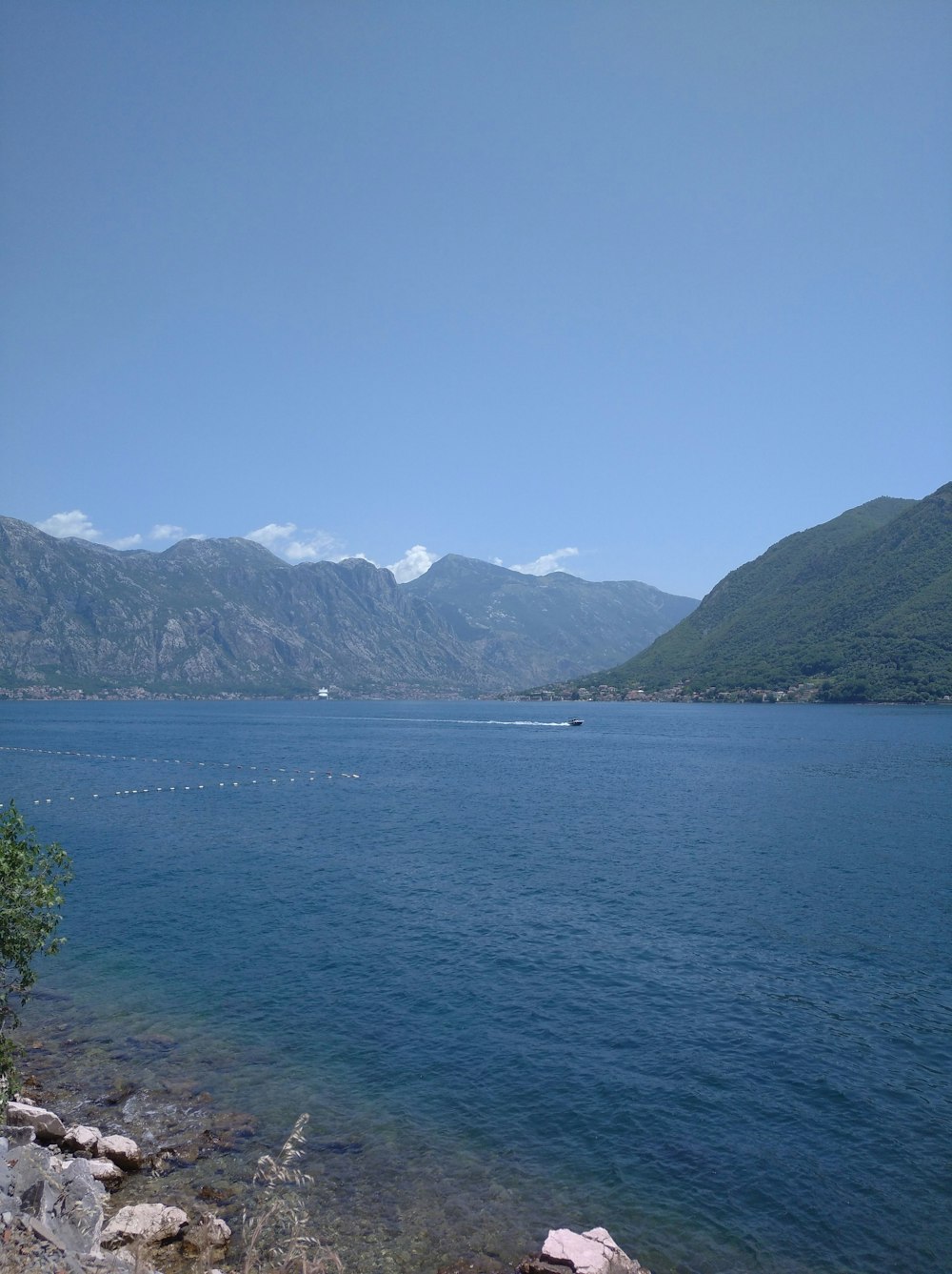 a large body of water surrounded by mountains