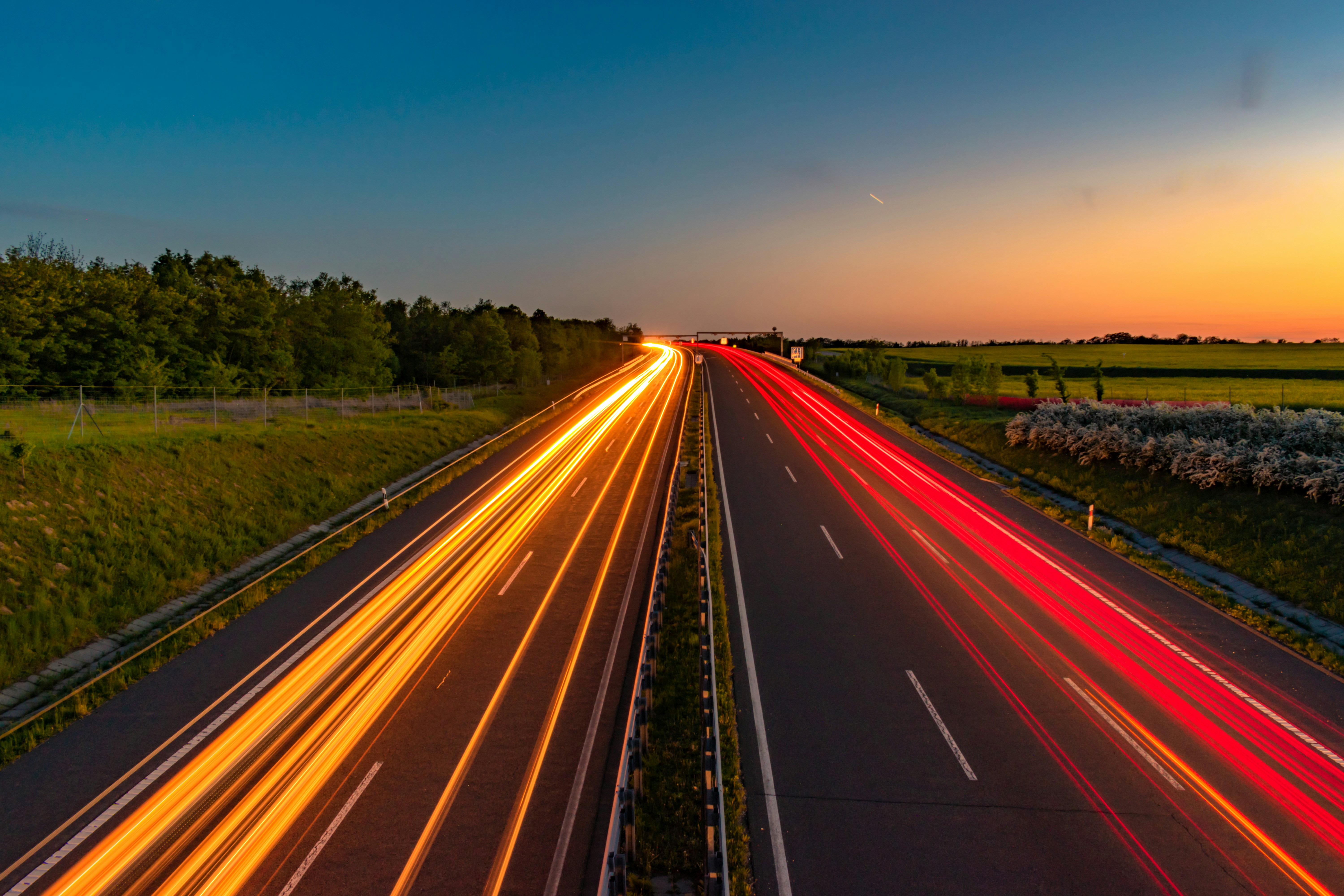 A long exposure shot of a highway at night