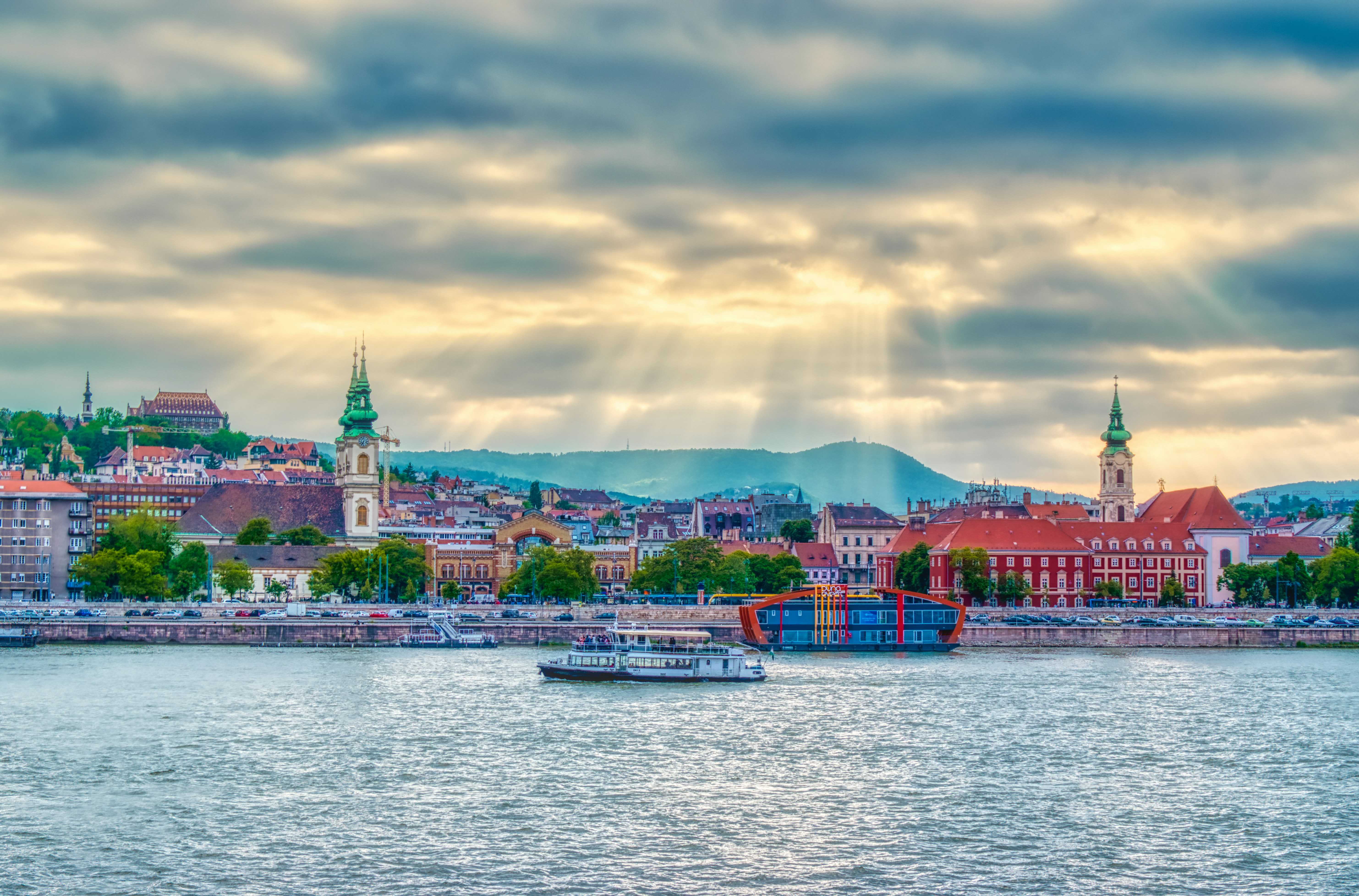 A large body of water with a city in the background