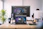 A vibrant workspace with a team passionately designing Android apps on multiple screens.