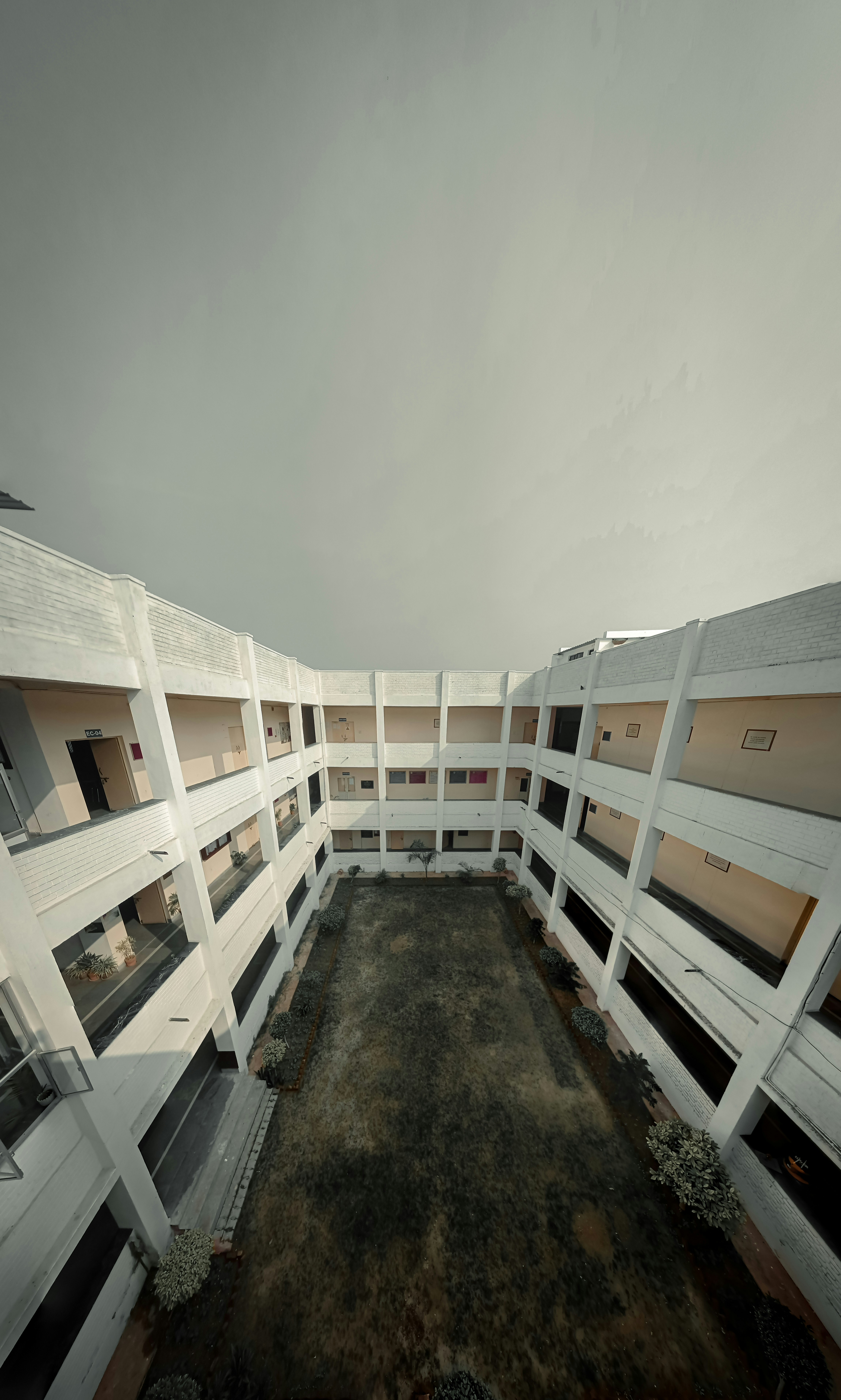 a room with multiple windows is shown in this image