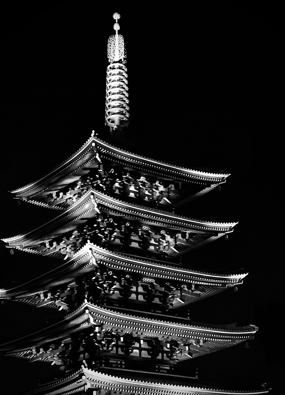 a black and white photo of a pagoda