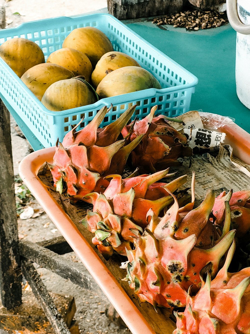 a tray of dragon fruit sitting on a table