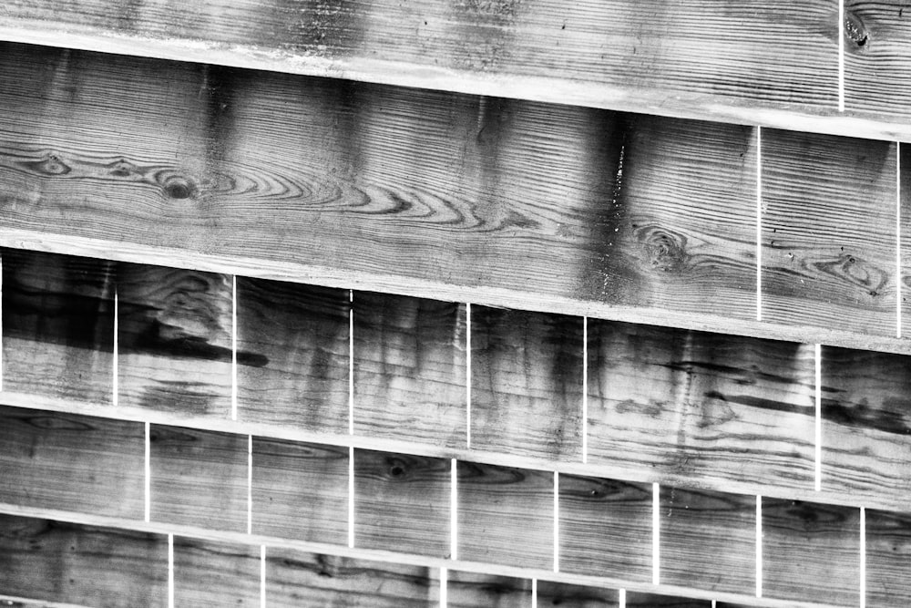 a black and white photo of a wooden building