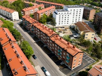 an aerial view of a city with many buildings