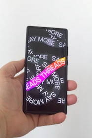 A dynamic screenshot of a lively post thread with colorful comments and images.