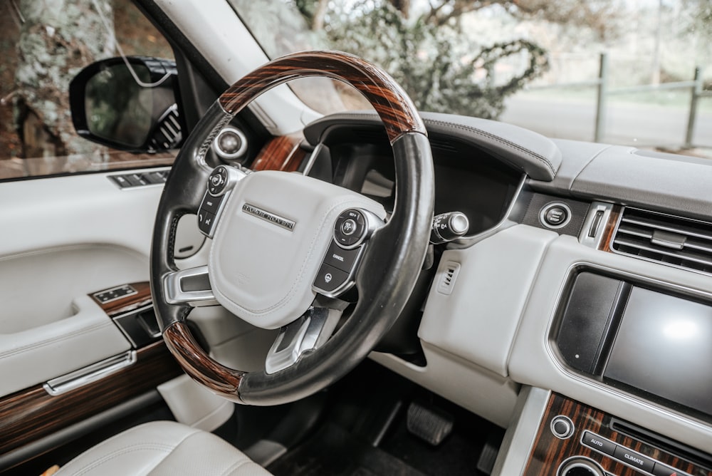 the interior of a car with a steering wheel