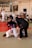 A group of students training together in a jiu-jitsu class.