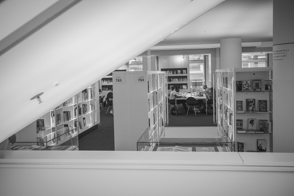 a black and white photo of a library